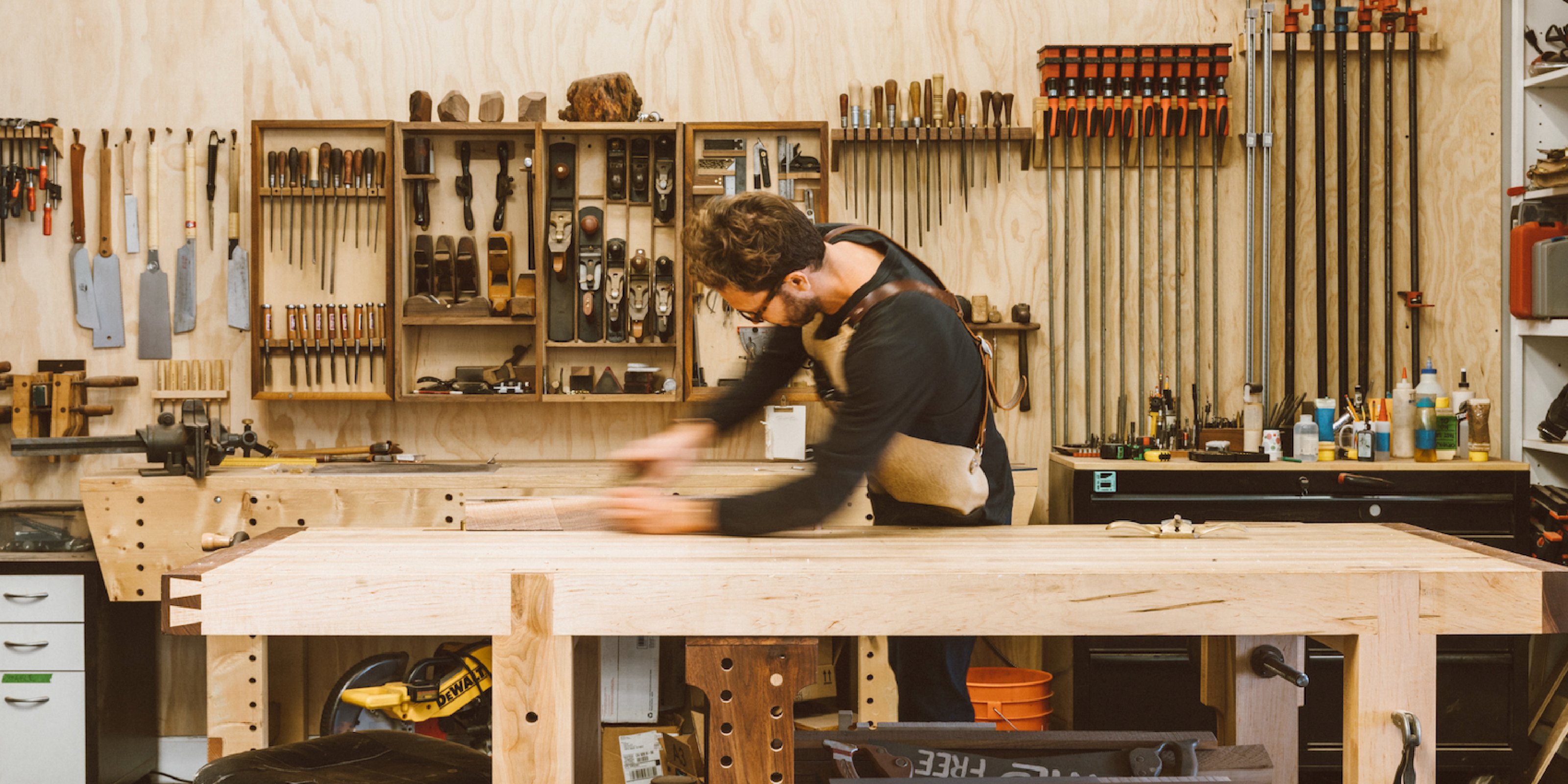 Craftsman woodworking in workshop