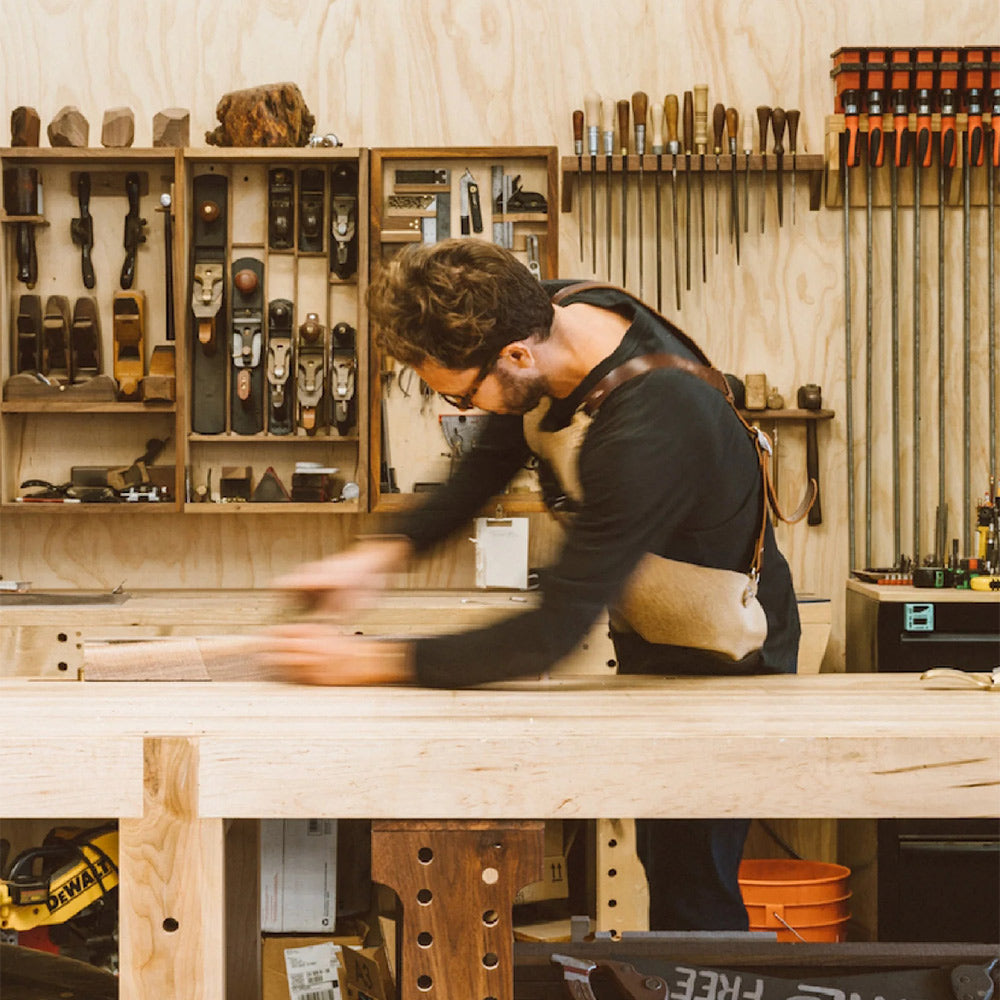 Woodworker using sanding tool