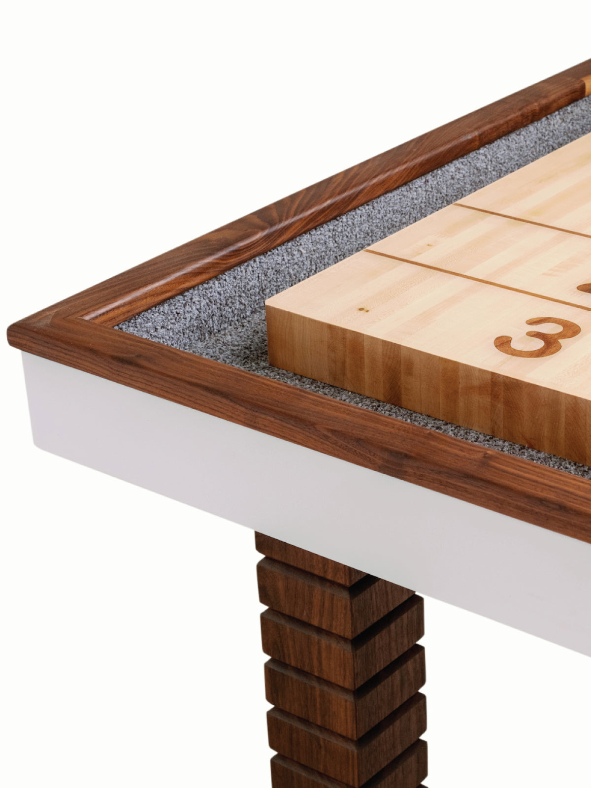 Corner detail of a handcrafted Neo shuffleboard table by Sean Woolsey Studio
