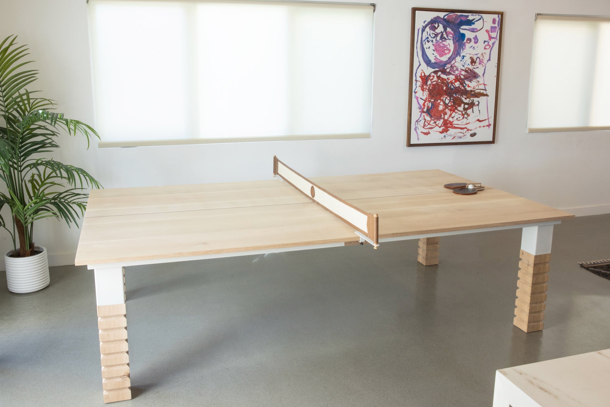 Neo Indoor Ping Pong Table - Stylish Addition to Your Game Room.